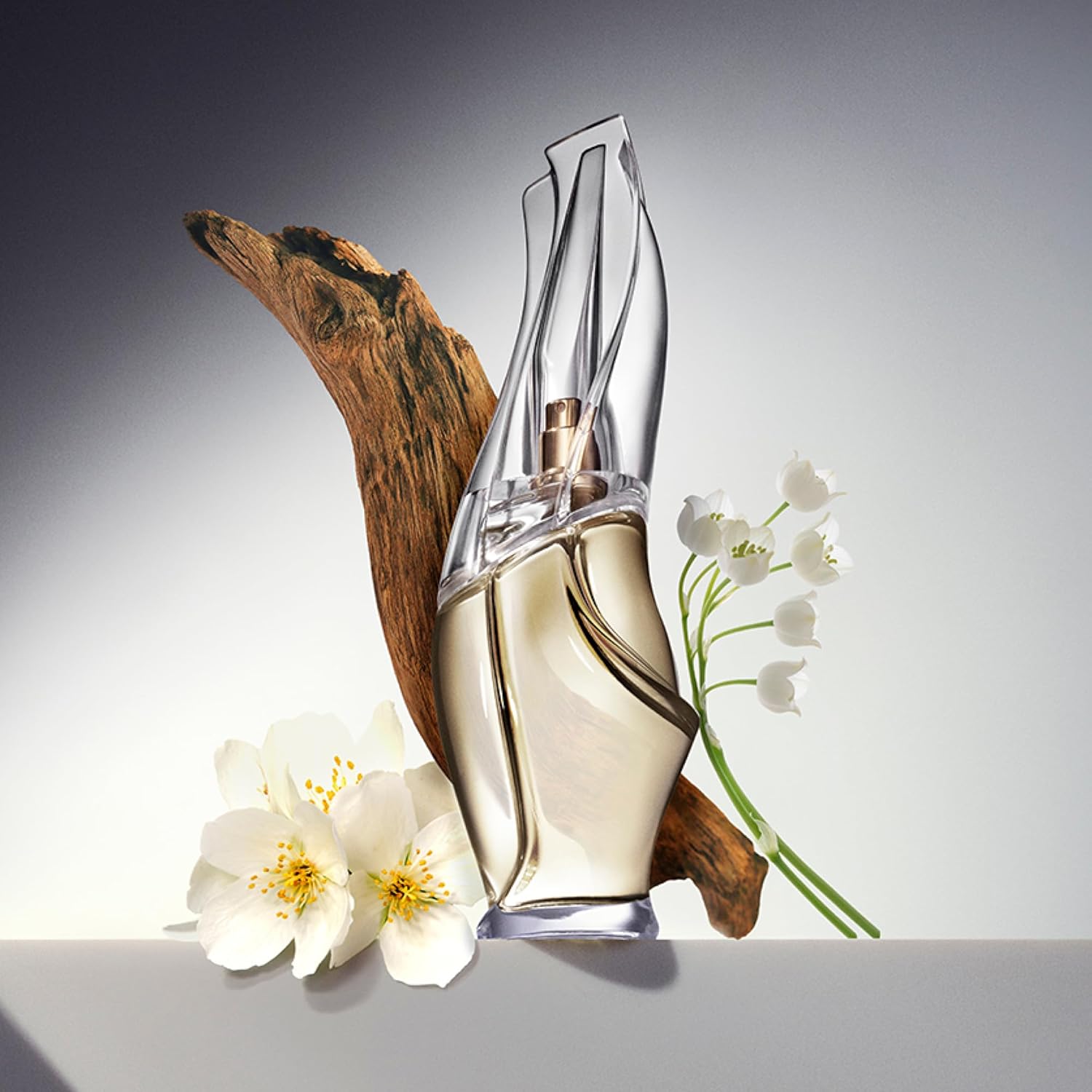 Donna Karan Cashmere Mist Eau de Parfum Everything 3 Piece Gift Set For Women - Perfume Spray 3.4 Fl. Oz., Deluxe Miniature 0.25 Fl. Oz., & Body Lotion 3.4 Fl. Oz. - Image 2
