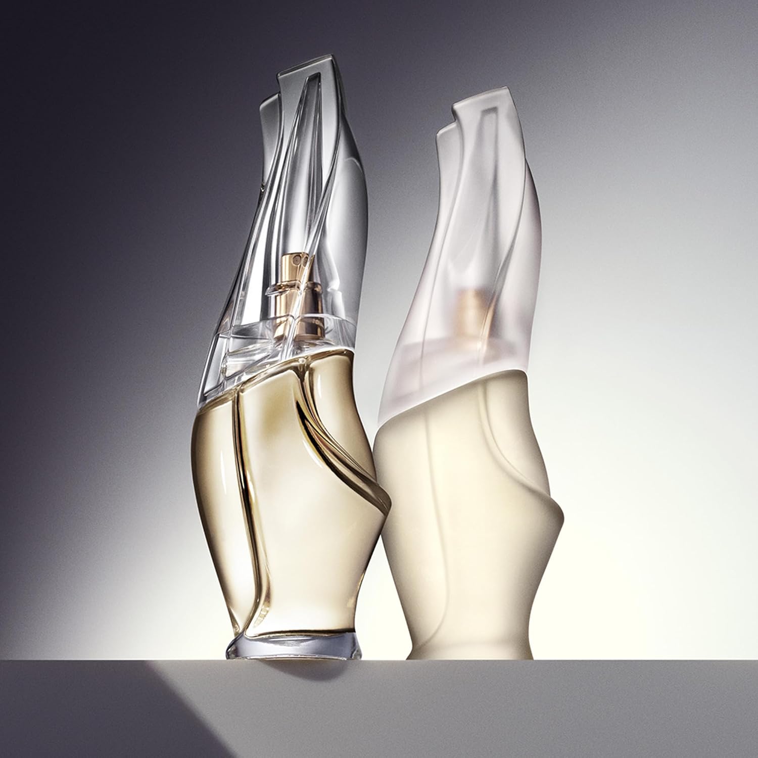 Donna Karan Cashmere Mist Eau de Parfum Everything 3 Piece Gift Set For Women - Perfume Spray 3.4 Fl. Oz., Deluxe Miniature 0.25 Fl. Oz., & Body Lotion 3.4 Fl. Oz. - Image 9