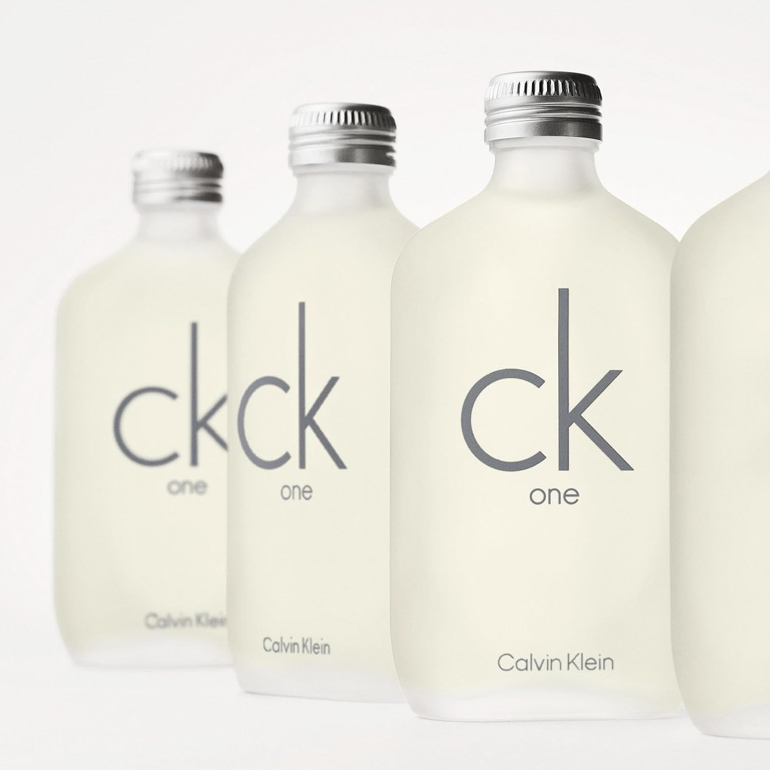 Calvin Klein CK One Eau de Toilette 4-Piece Gift Set ($159 Value) – 6.7 oz EDT, 0.5 oz EDT, 6.7 oz Body Lotion, 3.3 oz Shower Gel – With Notes of Green Tea – Long-Lasting Unisex Fragrance - Image 4
