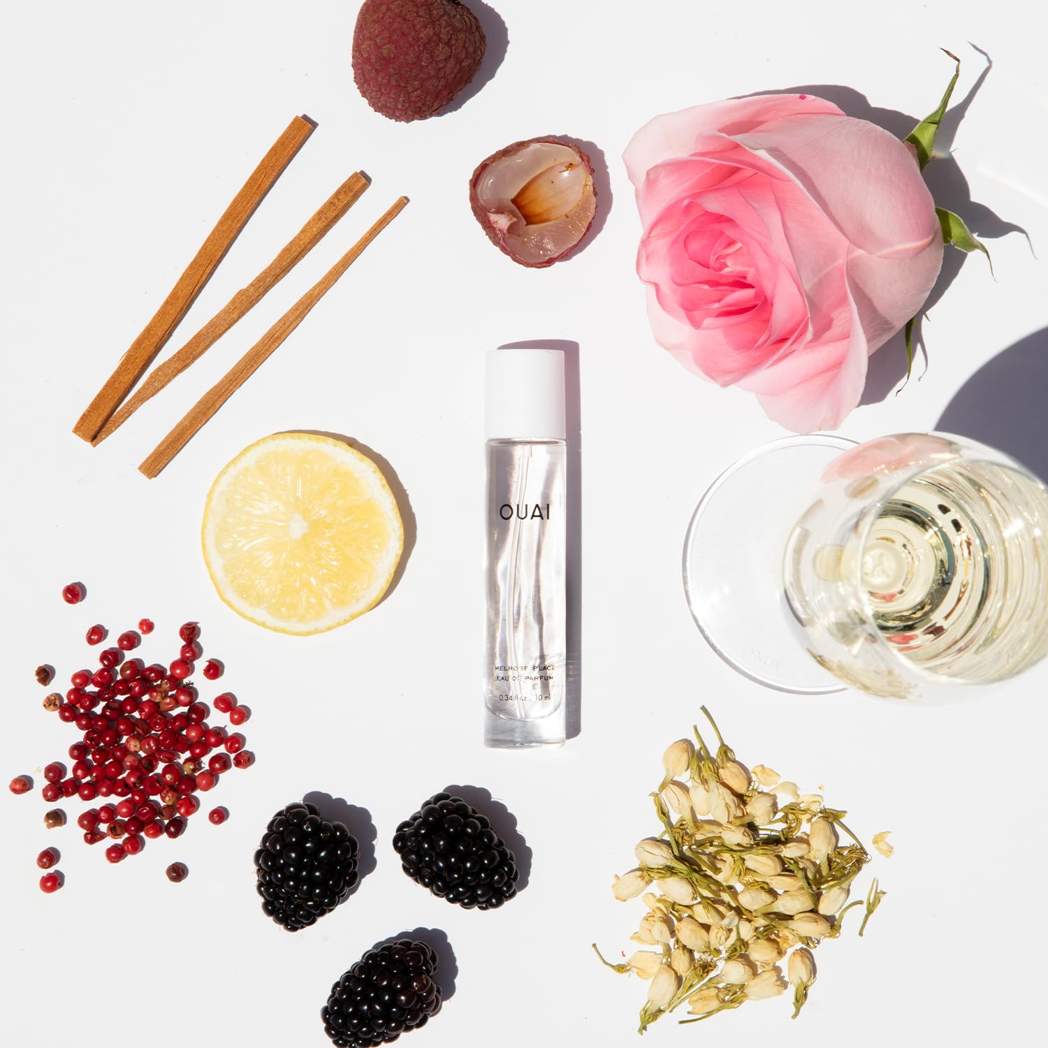 OUAI Melrose Place Eau de Parfum Travel Size - Elegant Womens Perfume for Everyday Wear - Fresh Floral Scent has Notes of Champagne, Bergamot & Rose with Delicate Hints of Cedarwood & Lychee (.34 Oz) - Image 2