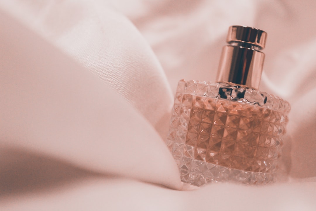 A collection of perfume bottles with different shapes and colors, representing various personalities and styles.